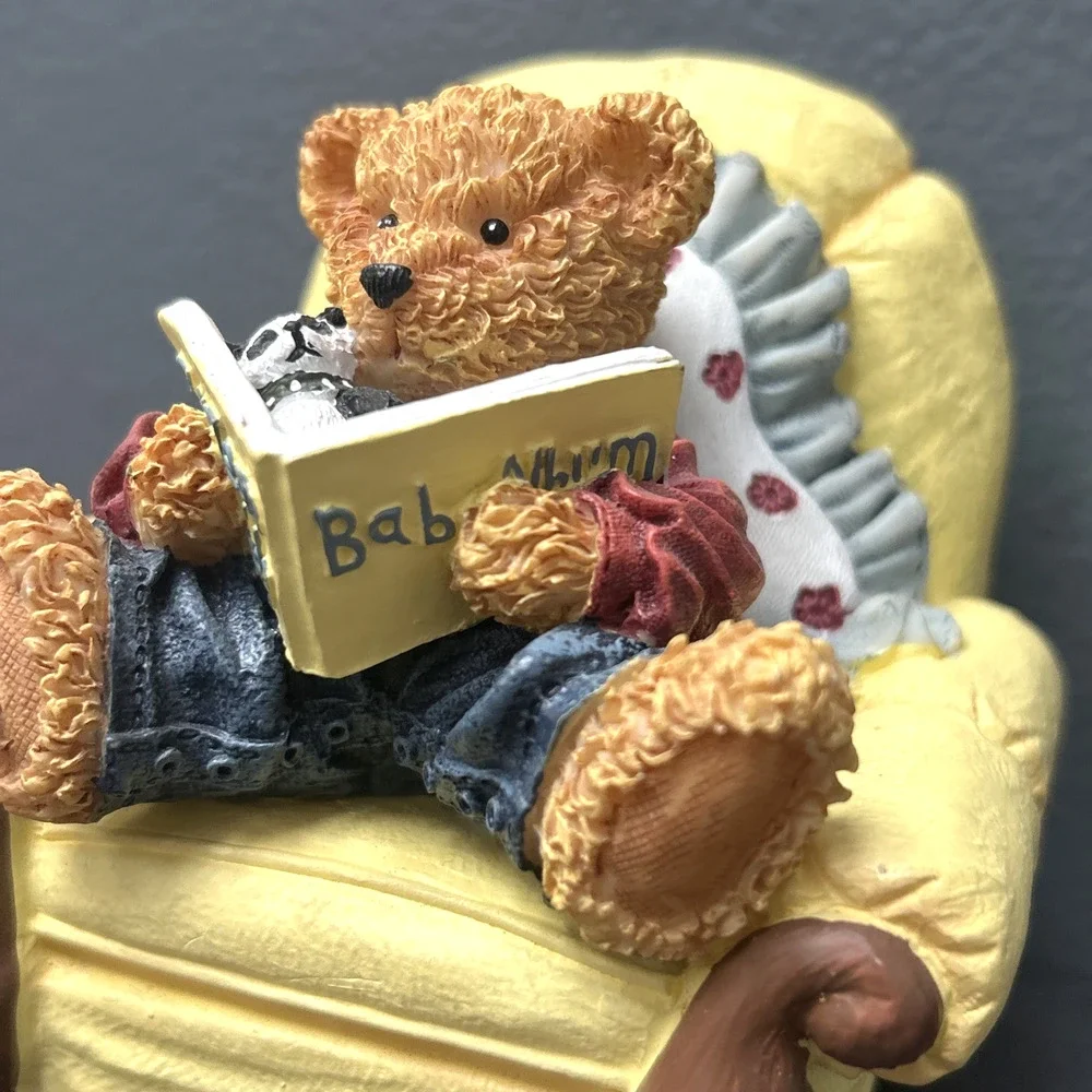 Baby Bear Sitting In Yellow Chair Reading Book With Stuffed Animal Toy Figurine